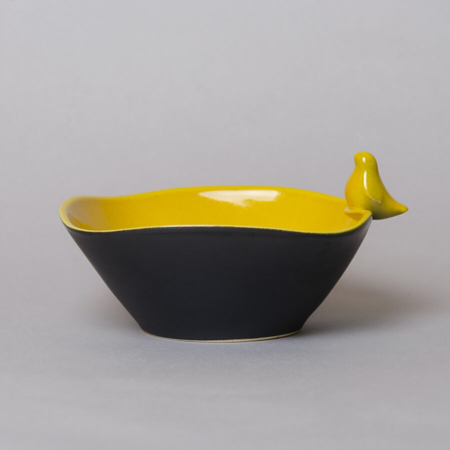 Ceramic snack bowl with bird figurine, lemon yellow