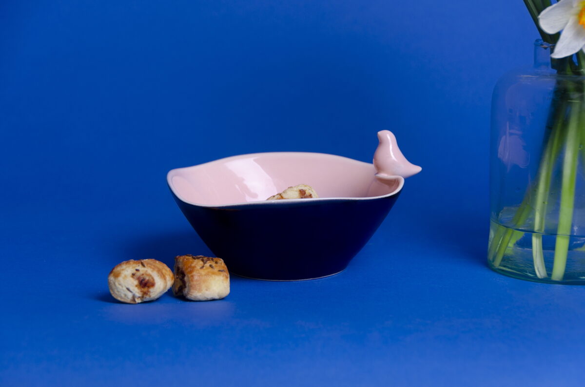 Ceramic snack bowl with bird figurine, dusty pink