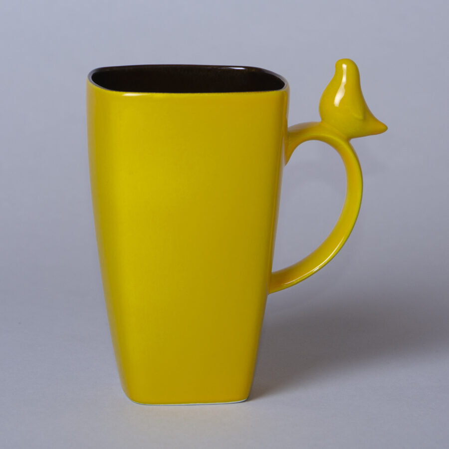 Large ceramic mug with bird figurine, lemon yellow