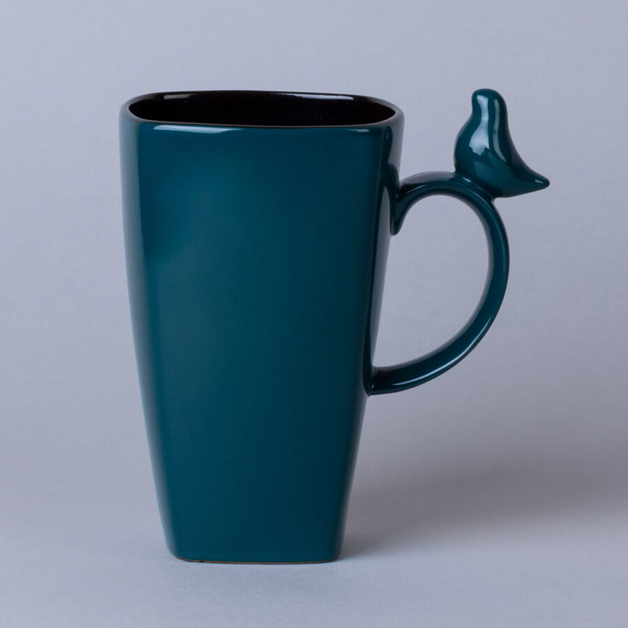 Large ceramic mug with bird figurine, teal